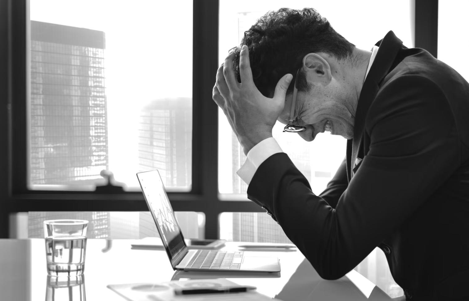 https://www.freepik.com/free-photo/stressed-young-businessman-overworking_3277783.htm#query=finance%20crisis&position=33&from_view=search&track=ais#position=33&query=finance%20crisis